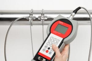 The versatile clamp-on ultrasonic flowmeter KATflow 200 can be operated single-handed which makes it an ideal tool for use in confined spaces or when working at height.