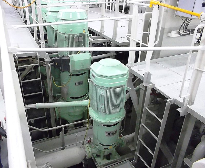 DESMI engine room pumps installed in a ship’s machinery space with railings