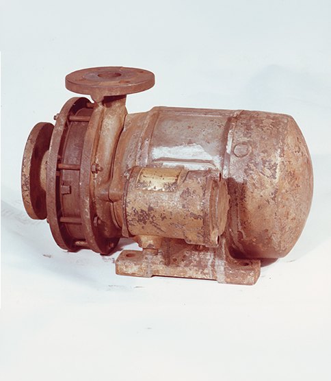 Historic centrifugal pump with electric motor mounted on a base plate
