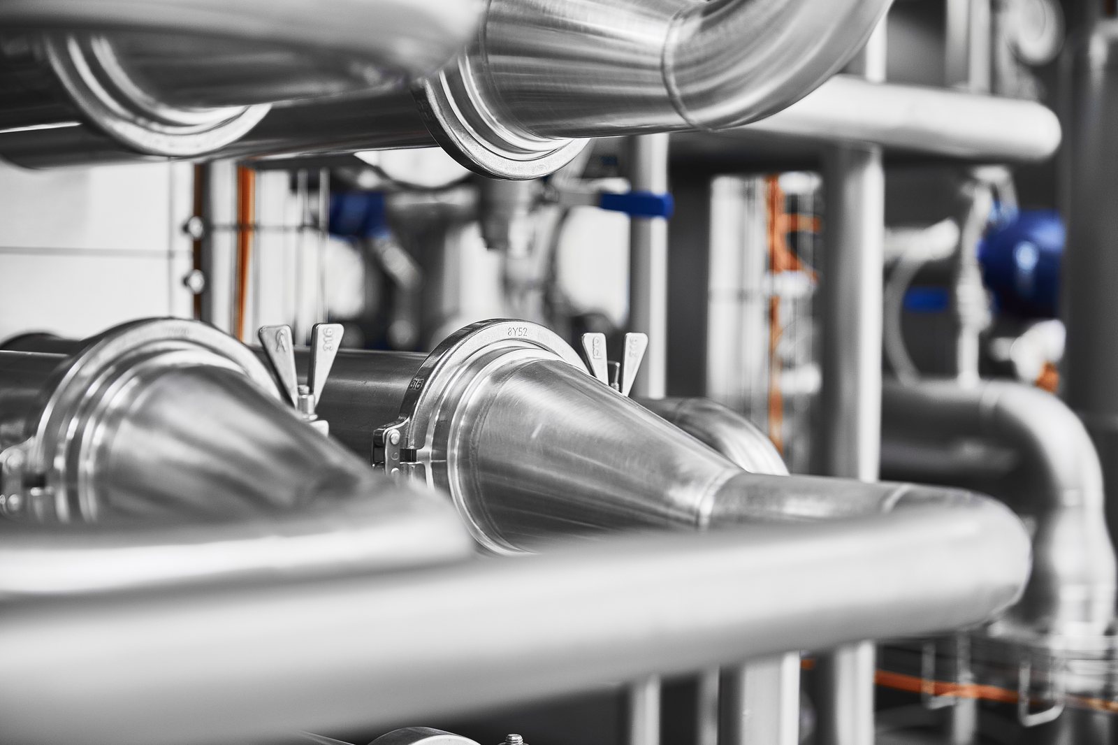 Stainless steel corrugated tube heat exchanger pipework of an HRS MI Series pasteuriser