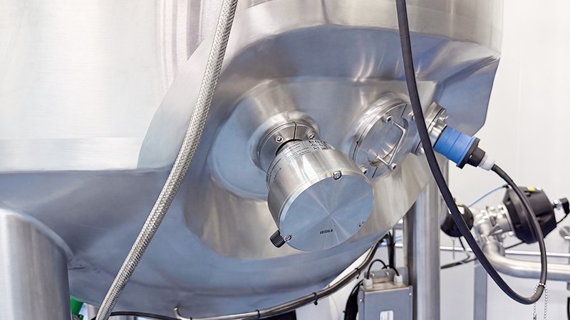 Vaisala process refractometer installed on a stainless steel process vessel for inline refractive index monitoring