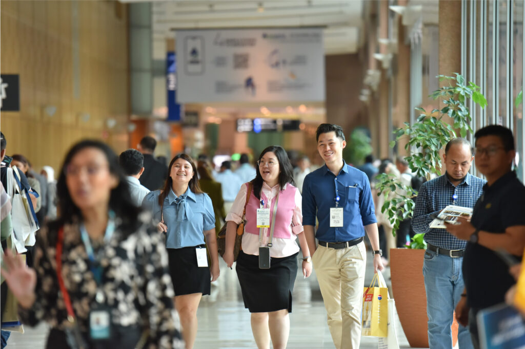 Trade visitors walking through the ASIAWATER exhibition at the Kuala Lumpur Convention Centre