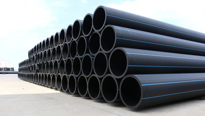Stack of black HDPE pipes with blue stripes