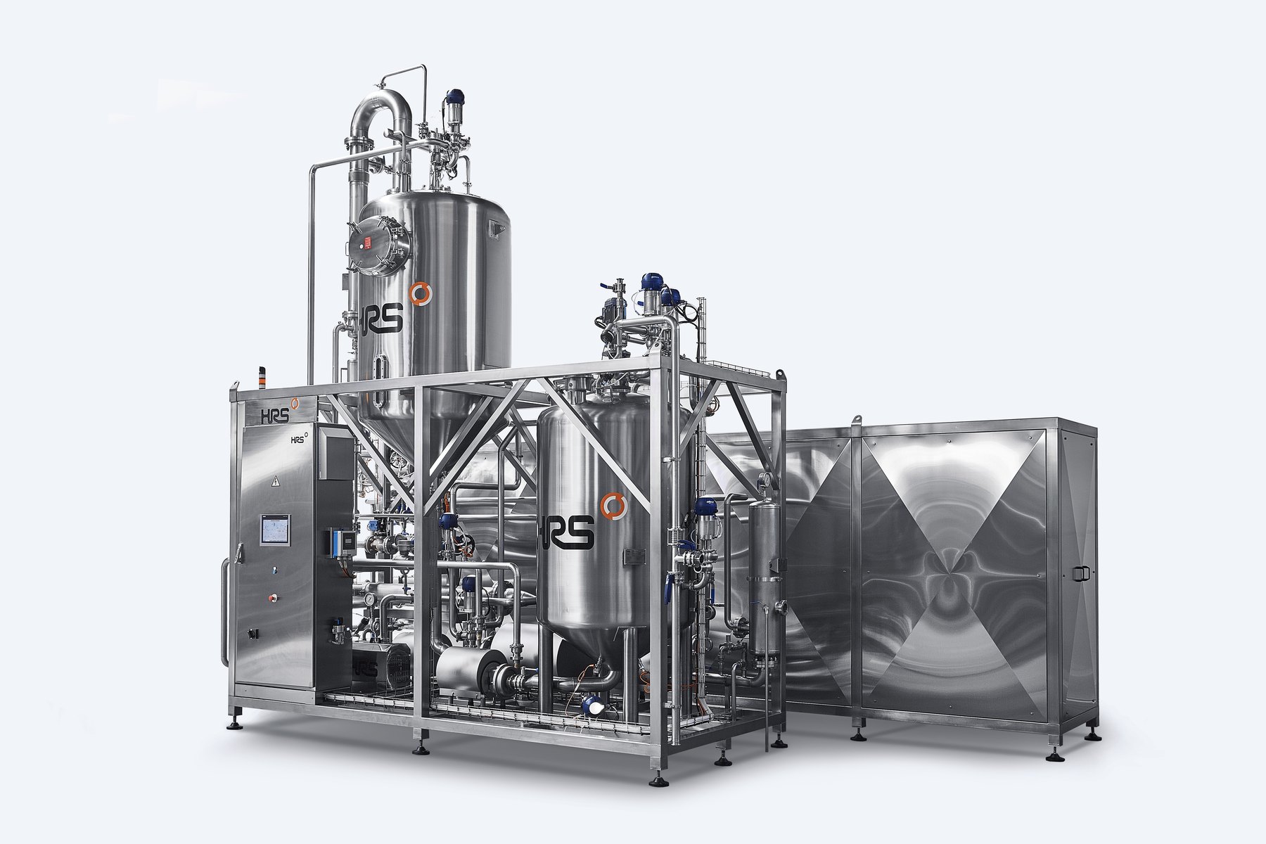 HRS Thermblock system with two stainless steel process vessels mounted on a frame next to an enclosed heat exchanger unit