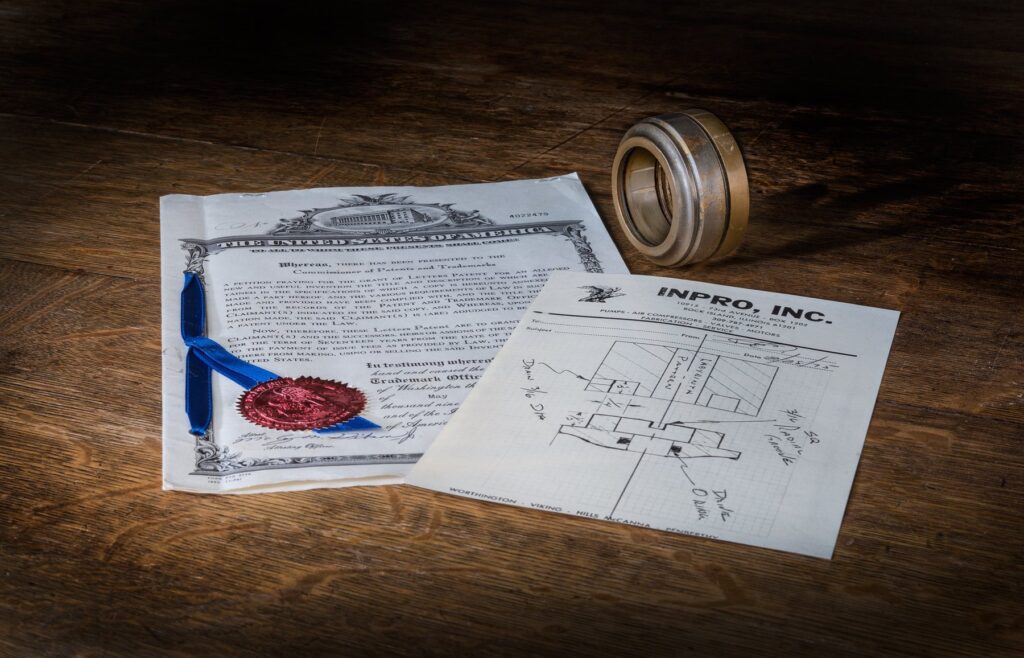 Bearing isolator patent certificate, original hand sketch and early bearing isolator