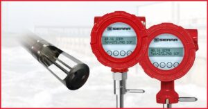 Sierra Instruments ½-inch insertion probe next to two red TM100 and TM500 thermal mass flow meters with digital display